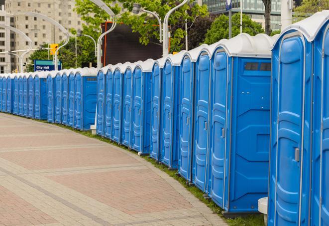 hygienic portable restrooms lined up at a beach party, ensuring guests have access to the necessary facilities while enjoying the sun and sand in Bridgewater, MA